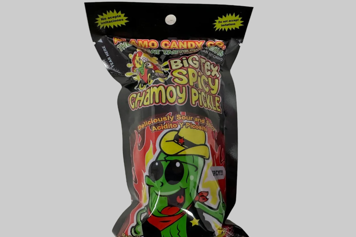 Colorful candy wrapper with cartoon character on a speckled surface
