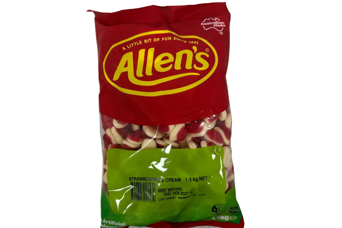 Red and green packet of Allen's candy on a gray surface