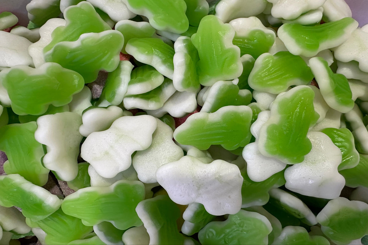 green and white gummy frogs