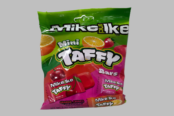 Packaging of Mike and Ike Mini Taffy Bars on a white surface